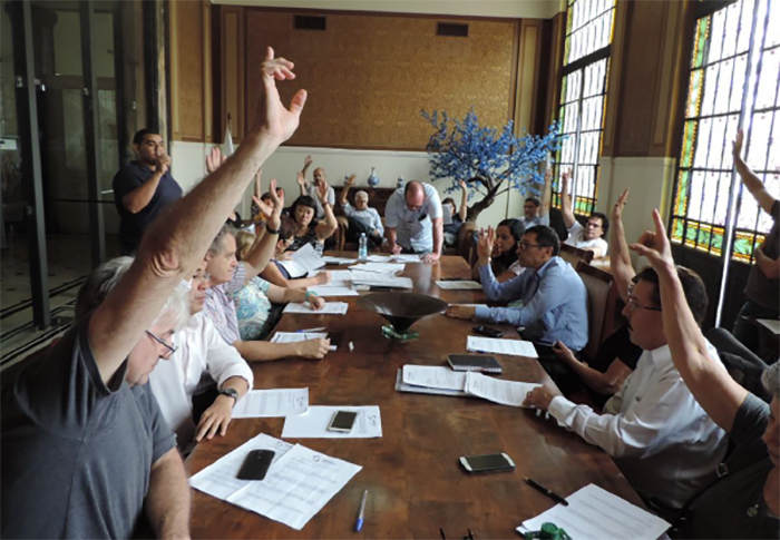 Members of the union representing Receita Federal officers vote to approve the slowdowns and strike.